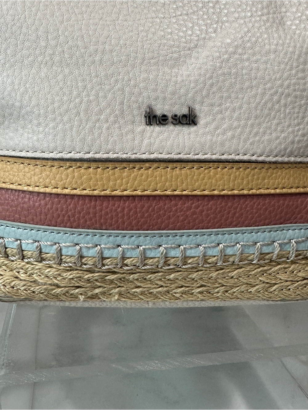 The Sak Ivy Leather Drawstring Bucket Bag cream coastal with striped woven trim - Picture 6 of 13